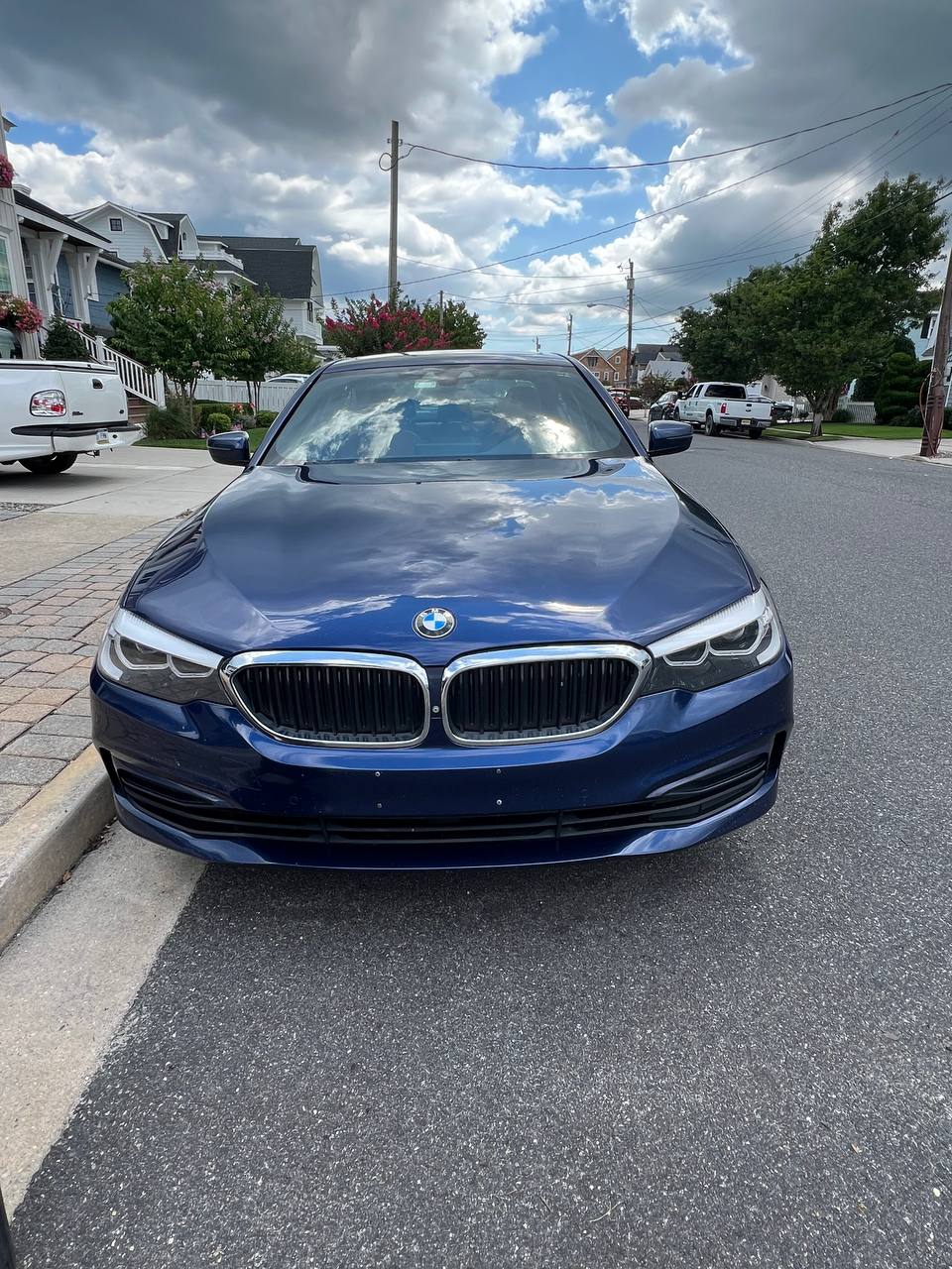 BMW 5 Series front end detailed to a mirror finish by CTJ Detail in Avalon NJ