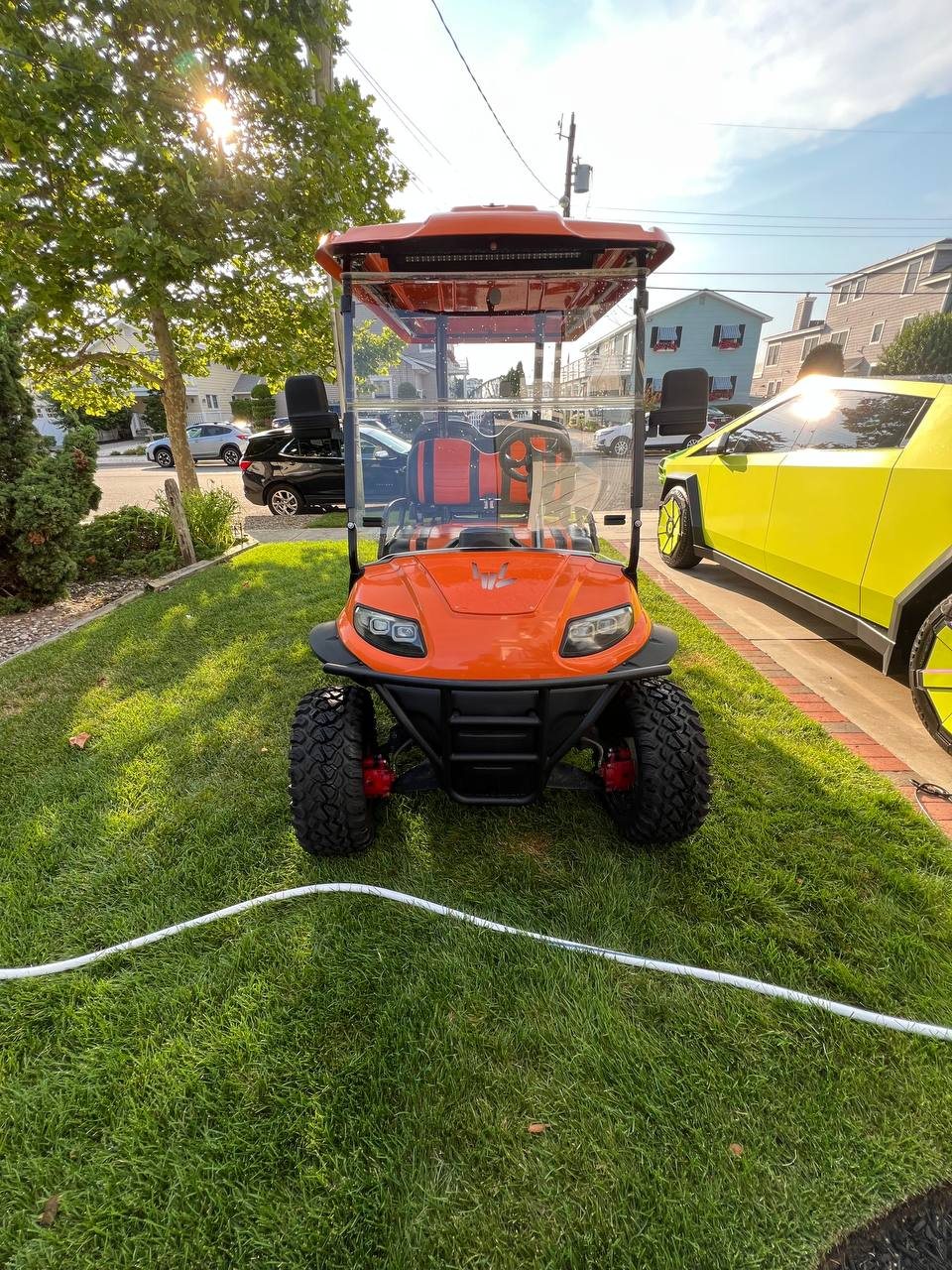 Custom orange golf cart front end detailed by CTJ Detail